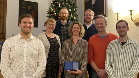 The Conservation Evidence team receiving the Vice Chancellor Award at Cambridge University